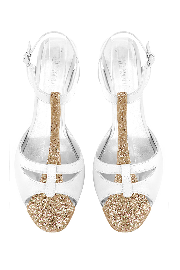 Women's gold and pure white elegant T-strap closed-toe heels. Round toe. High slim heel - Top view